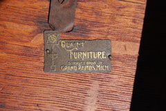 Stickley Brothers Quaint brass tag located on the underside of the table top. 